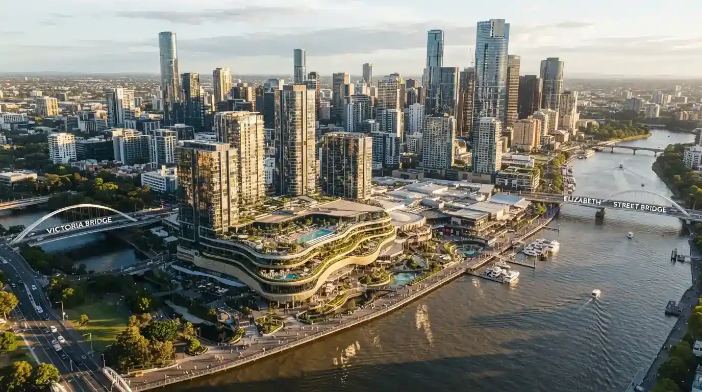 Wide view of the Queen's Wharf precinct along the Brisbane River showing the integrated resort development and pedestrian boardwalk